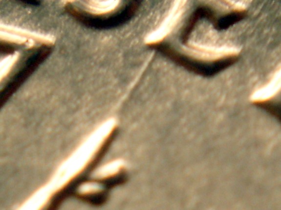 1999-D-New-Jersey-St.-Quarter---Extended-Flag-Pole-Die-Gouge